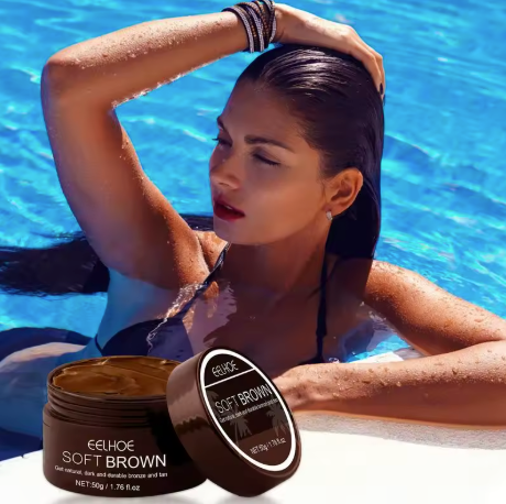 "Beach essentials including tanning gel, sun hat, and towel"