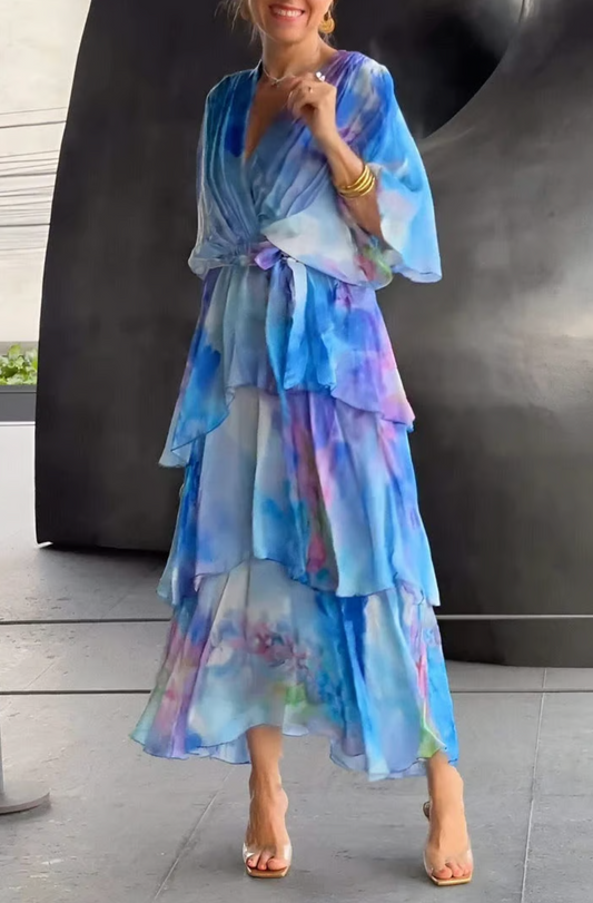 Model in blue Chic Everyday Dress walking confidently through a city street